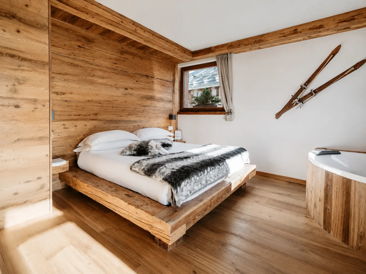 Camera in legno con vasca idromassaggio